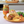 Shrimp wrap with chips and Branston Chilli on a plate