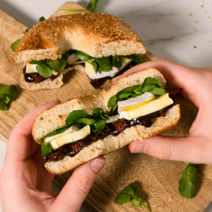 Person holding a sandwich with Branston Pickle Small Chunk