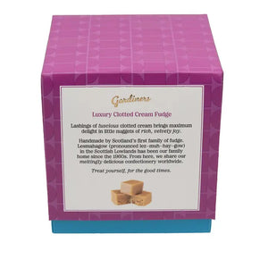 A purple and blue gift box for 'Gardeners' Luxury Clotted Cream Fudge' with a white text label on the front, set against a plain white background.