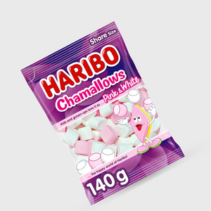 A 140g bag of Haribo Chamallows Pink & White share-size marshmallows, shown at an angle on a light gray background. The packaging is purple with red and white branding, and a clear window reveals pink and white marshmallows inside.