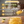 Jar of marmalade with a spoonful being lifted, set against a blurred kitchen background with text about Scottish heritage and quality.