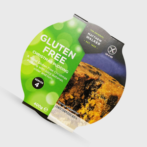 Gluten-free Christmas pudding packaging with green label on a white background