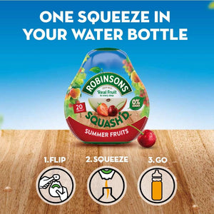Robinsons Squashed Summer Fruits packaging with instructions on a wooden surface and blue sky background