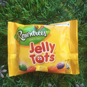 Packaging of Rowntrees Jelly Tots on a grass background
