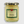 A glass jar of Thursday Cottage Handmade Brandy Butter with a black and gold checkered lid and a green holiday-themed label, set against a light gray background.
