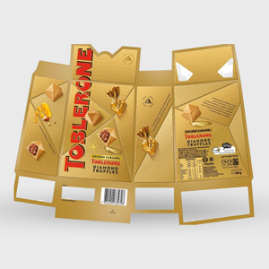 Gold Toblerone chocolate packaging on a white background
