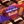 Cadbury Dairy Milk Lotus Biscoff chocolate bar packaging with a close-up view.