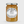 Jar of Tiptree Ginger Conserve with a white label on a light gray background