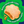 A cloud-shaped biscuit with a soft, chewy orange-brown fruity center, shown on a bright green wavy background with white text reading 'Buttery biscuit with a SOFT tangy-sweet FRUITY centre'.