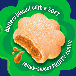 A cloud-shaped biscuit with a soft, chewy orange-brown fruity center, shown on a bright green wavy background with white text reading 'Buttery biscuit with a SOFT tangy-sweet FRUITY centre'.