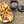 Nocilla Noir jar with a plate of bread sticks on a woven surface