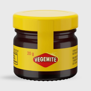 Jar of Vegemite with yellow lid and label on a white background