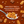 Promotional image of Weetabix Crispy Minis with chocolate chips on a brown background.